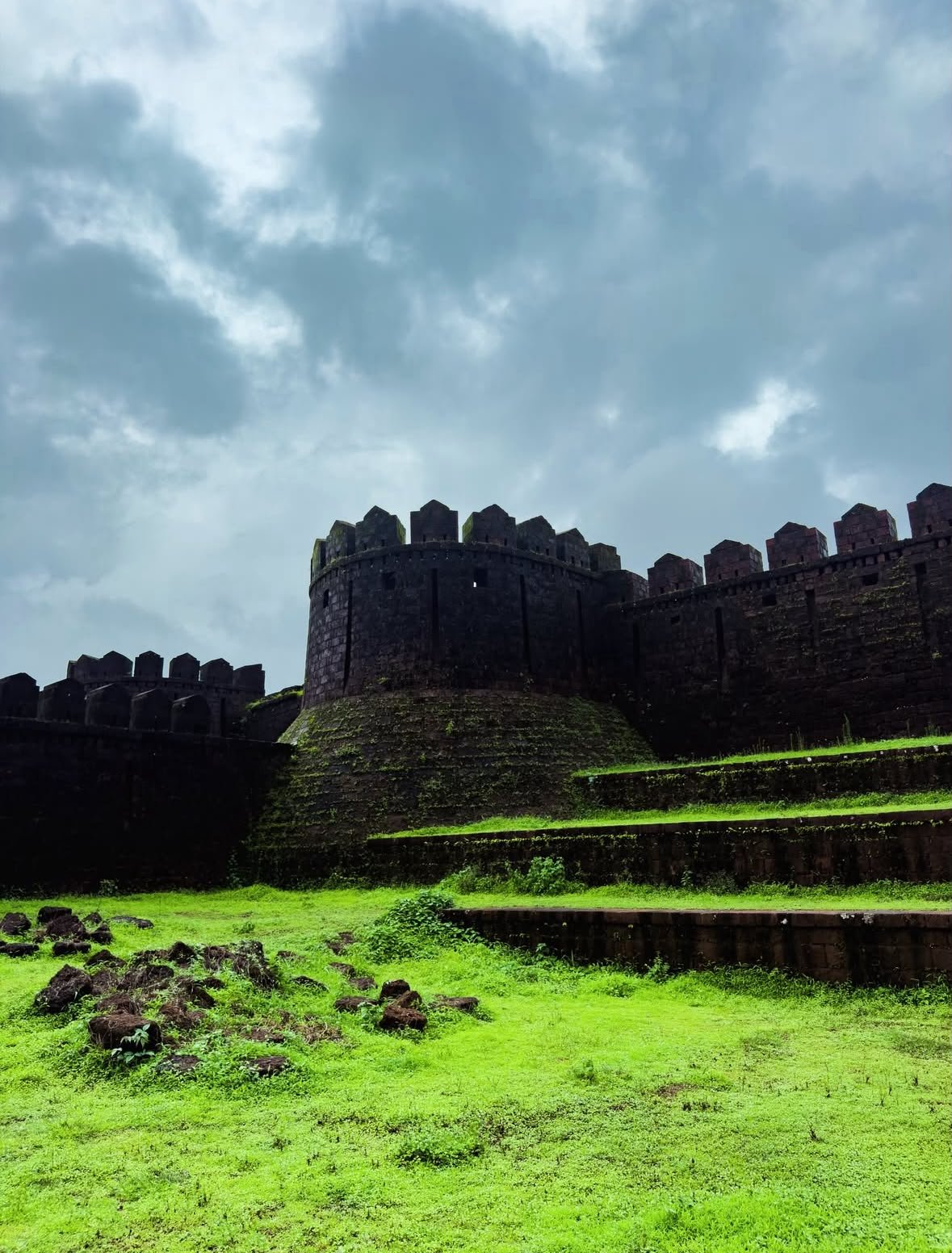 Mirjan Fort Karnataka — ancient laterite stone fort surrounded by tropical monsoon greenery and moat
